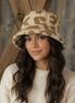 Beige and camel bucket hat by La Plaza Mall featuring a stylish wide brim and casual design.