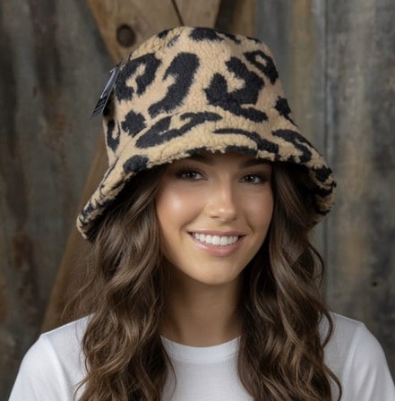 Tan and black leopard bucket hat by La Plaza Mall, featuring a stylish leopard print design perfect for casual wear.
