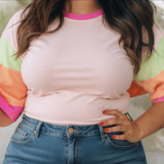 Little Daisy Closet color block half sleeve top featuring vibrant, contrasting fabric sections and a casual, comfortable fit.
