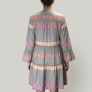 Little Daisy Closet ethnic print dress with vibrant patterns and flowing fabric, perfect for casual or special occasions.
