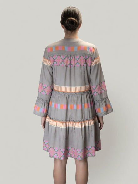 Little Daisy Closet ethnic print dress with vibrant patterns and flowing fabric, perfect for casual or special occasions.