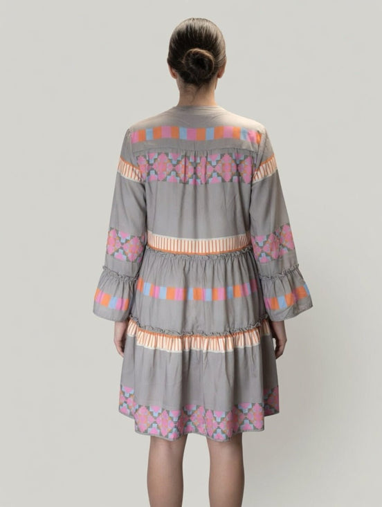 Little Daisy Closet ethnic print dress with vibrant patterns and flowing fabric, perfect for casual or special occasions.
