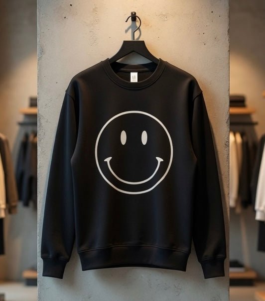 Oat Collective happy face sweatshirt top featuring a cheerful smiling face graphic on soft fabric, casual and comfortable wear