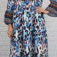 Leopard print 3/4 sleeve tiered maxi dress by PRETTY BASH featuring a flowing silhouette and stylish tiered layers.