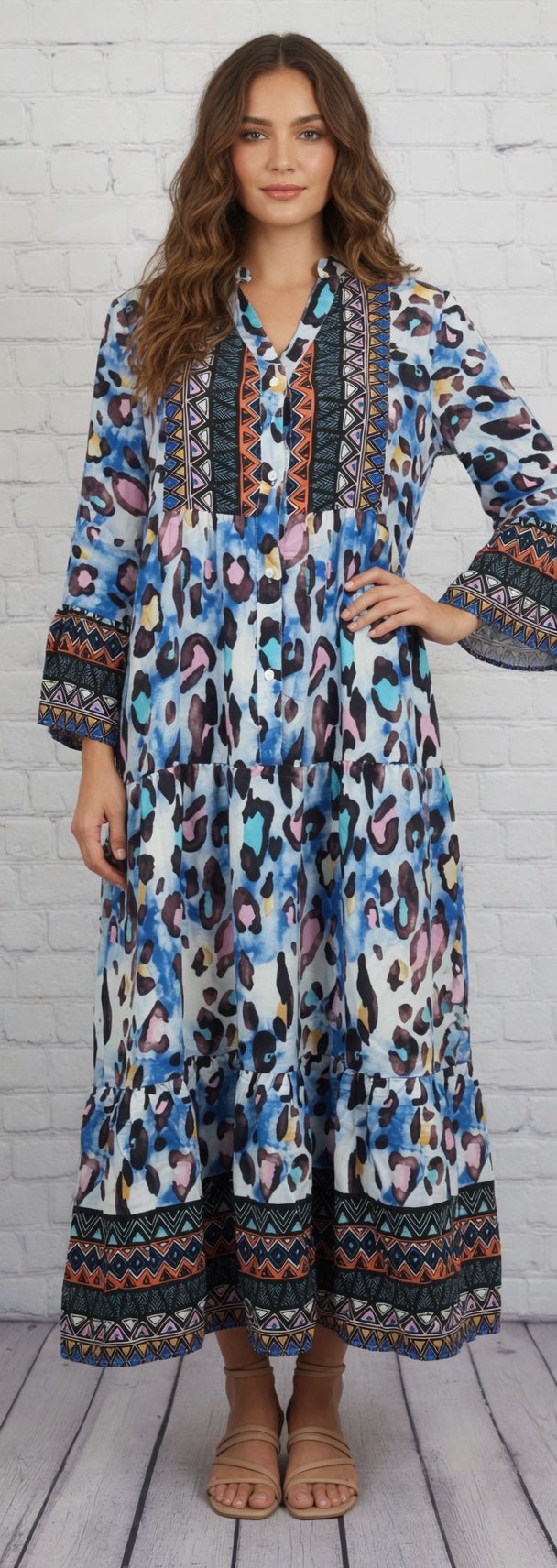 Leopard print 3/4 sleeve tiered maxi dress by PRETTY BASH featuring a flowing silhouette and stylish tiered layers.