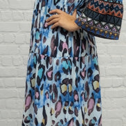 Leopard print 3/4 sleeve tiered maxi dress by PRETTY BASH, flowing fabric with a stylish tiered design and relaxed fit.
