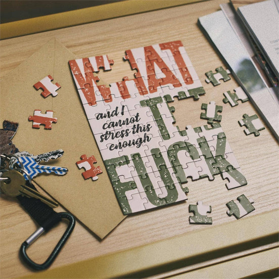 Questionables Cannot Stress Puzzle Card featuring humorous and witty stress-relief messages on a colorful card.
