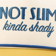 Questionables Kinda Shady Trucker Hat featuring a mesh back and curved brim in a casual, stylish design.