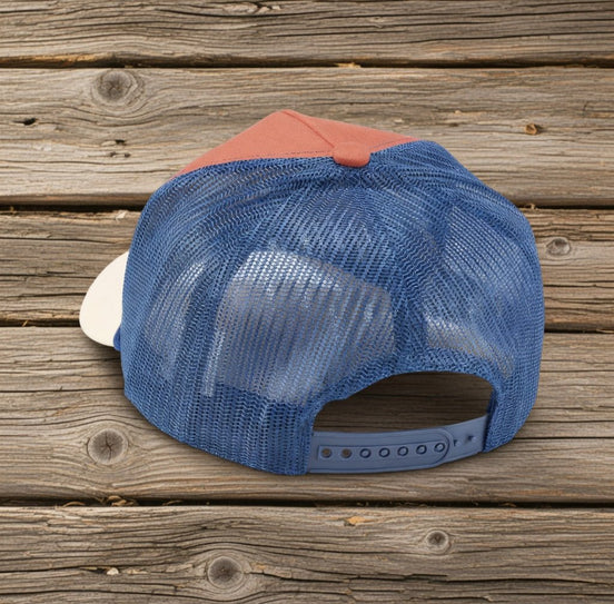 Questionables Not Bossy Trucker Hat with mesh back and curved brim, casual fashion accessory for outdoor wear.