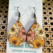 Hand-painted boho floral design on lightweight maple wood by Seasideblooms, showcasing vibrant floral artwork and natural wood grain.