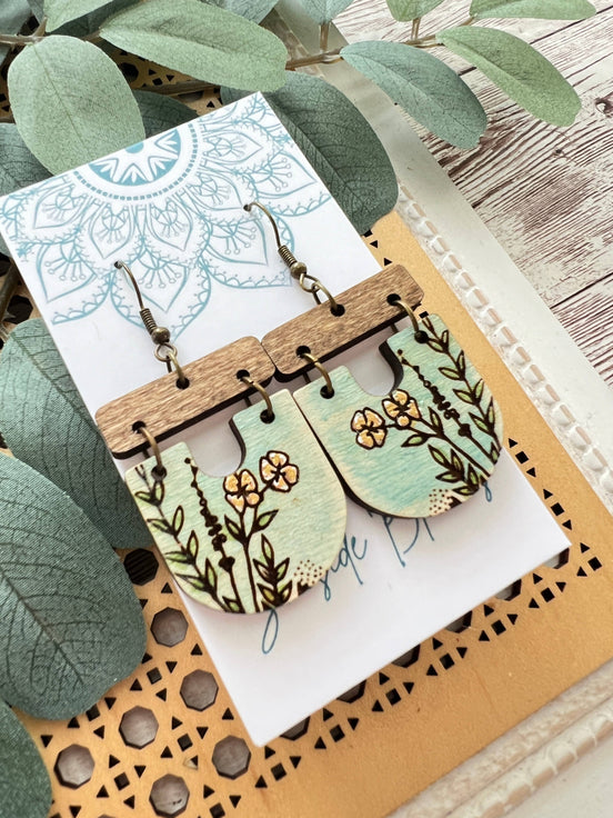 Lightweight boho maple wood earrings with hand-painted floral design by Seasideblooms, featuring natural wood texture and vibrant colors.