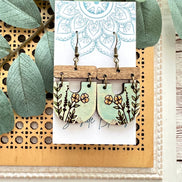 Hand-painted boho maple wood earrings with floral design by Seasideblooms, lightweight and stylish jewelry accessory.