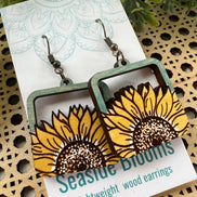 Hand-painted lightweight maple wood sunflower earrings from Seasideblooms in a boho style, featuring natural wood grain and floral design.