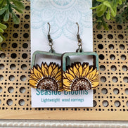 Lightweight boho sunflower earrings made of hand-painted maple wood by Seasideblooms, featuring a natural sunflower design.