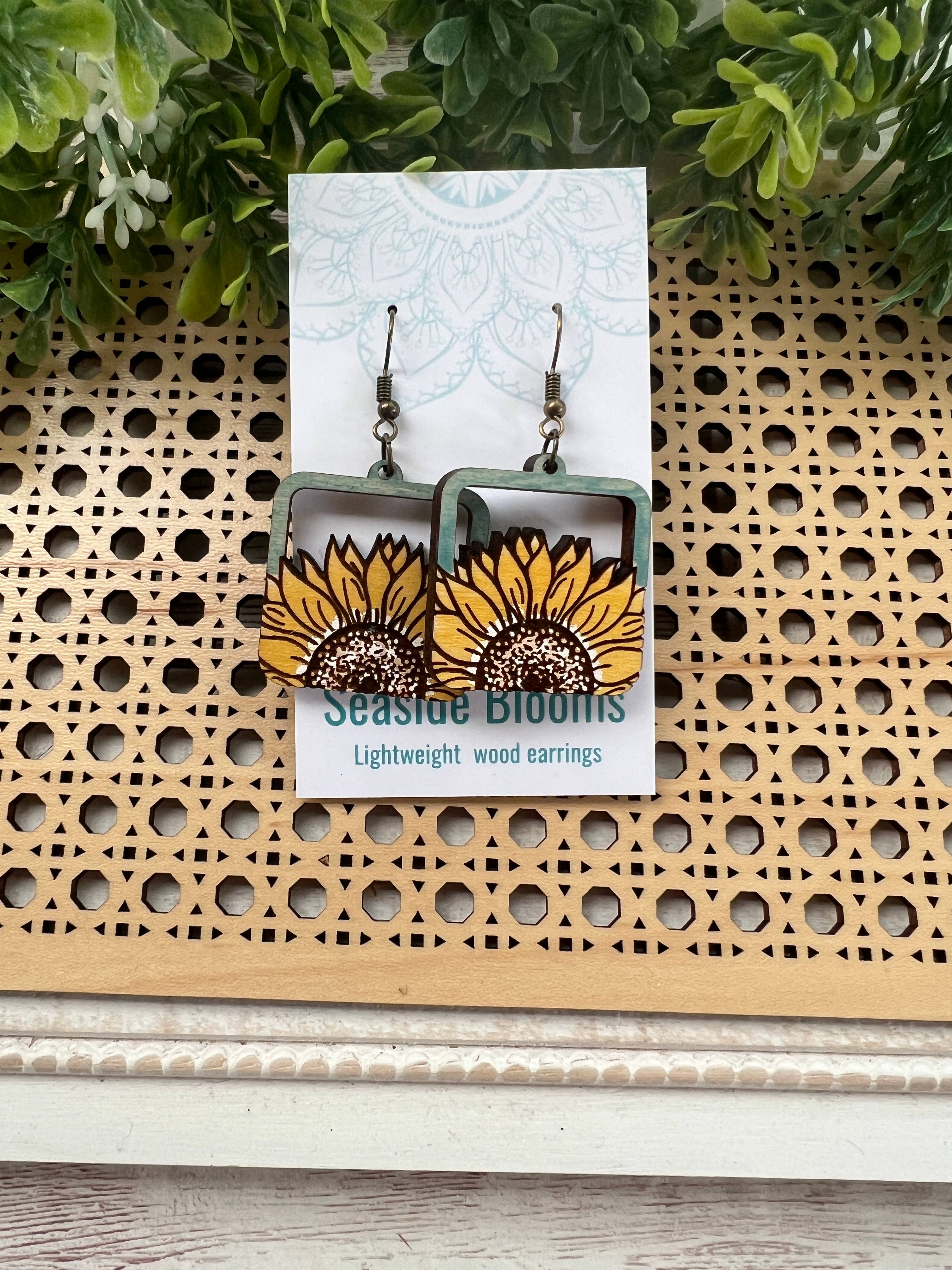 Hand-painted lightweight maple wood sunflower earrings by Seasideblooms featuring a boho style and natural floral design.