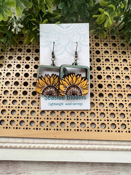Hand-painted lightweight maple wood sunflower earrings by Seasideblooms featuring a boho style and natural floral design.