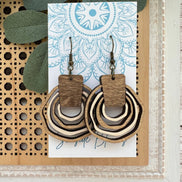 Hand-painted lightweight boho wooden hoops by Seasideblooms featuring natural wood finish and artistic design.