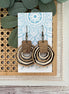 Hand-painted lightweight boho wooden hoops by Seasideblooms featuring natural wood finish and artistic design.