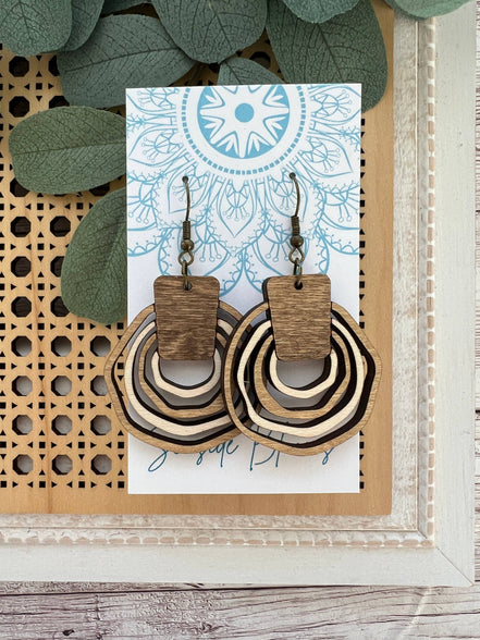 Hand-painted lightweight boho wooden hoops by Seasideblooms featuring natural wood finish and artistic design.