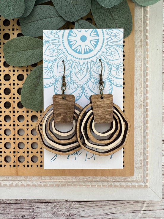 Hand-painted lightweight boho wooden hoops by Seasideblooms featuring natural wood finish and artistic design.