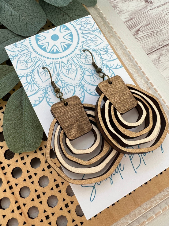 Hand-painted lightweight wooden hoop earrings by Seasideblooms featuring a boho style with natural wood finish.