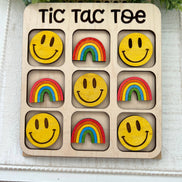 Maple wood Tic Tac Toe board with hand-painted game pieces, crafted by Seasideblooms, featuring intricate painted designs on each piece.