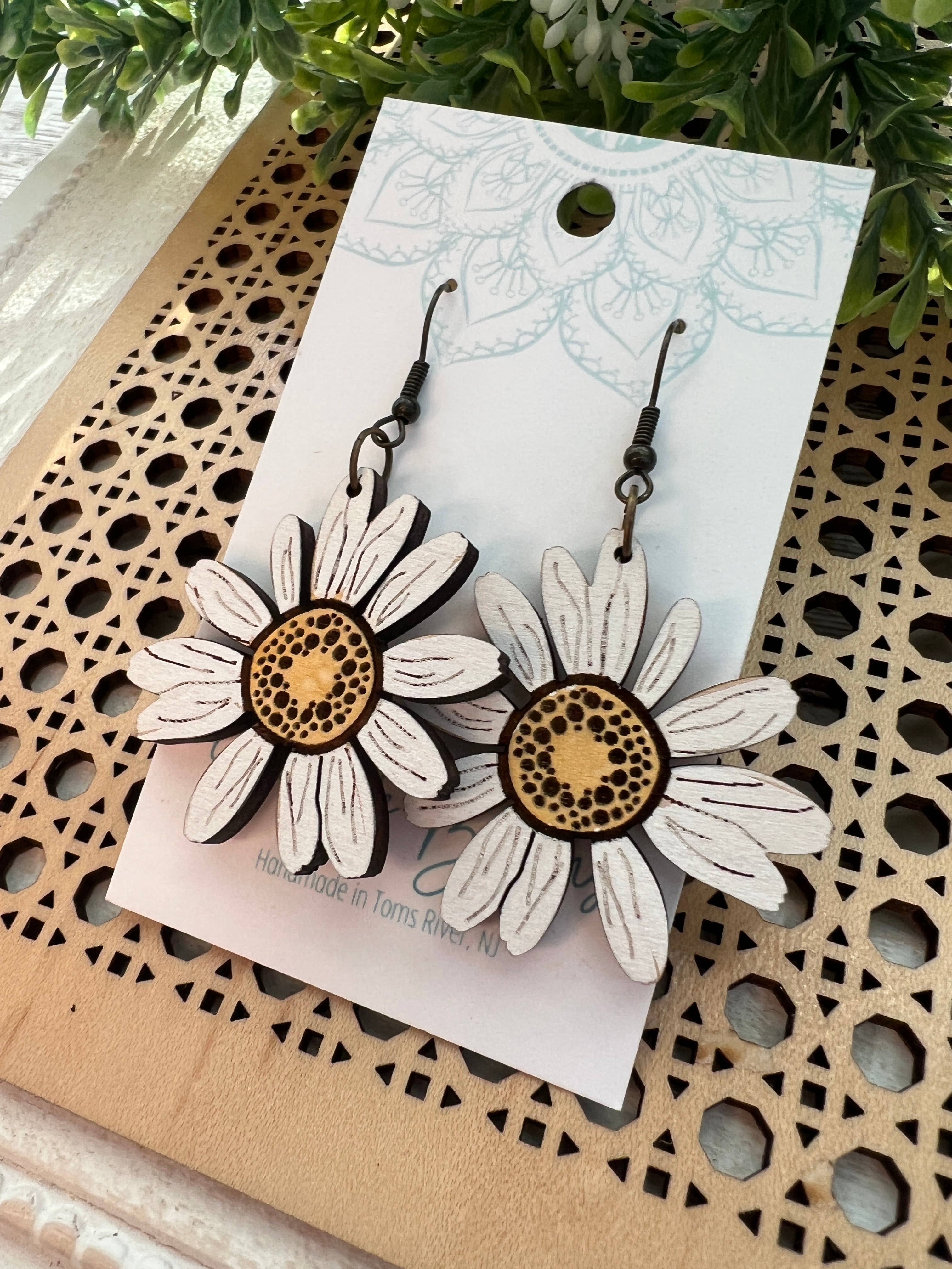 Lightweight yellow Daisy Maple Wood earrings with hand-painted floral design by Seasideblooms.