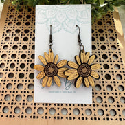 Seasideblooms yellow daisy maple wood earrings, hand-painted, lightweight jewelry with floral design and natural wood texture.