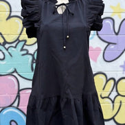 Black mini dress from Shiying Fashion featuring a fitted silhouette and stylish design, perfect for casual or evening wear.