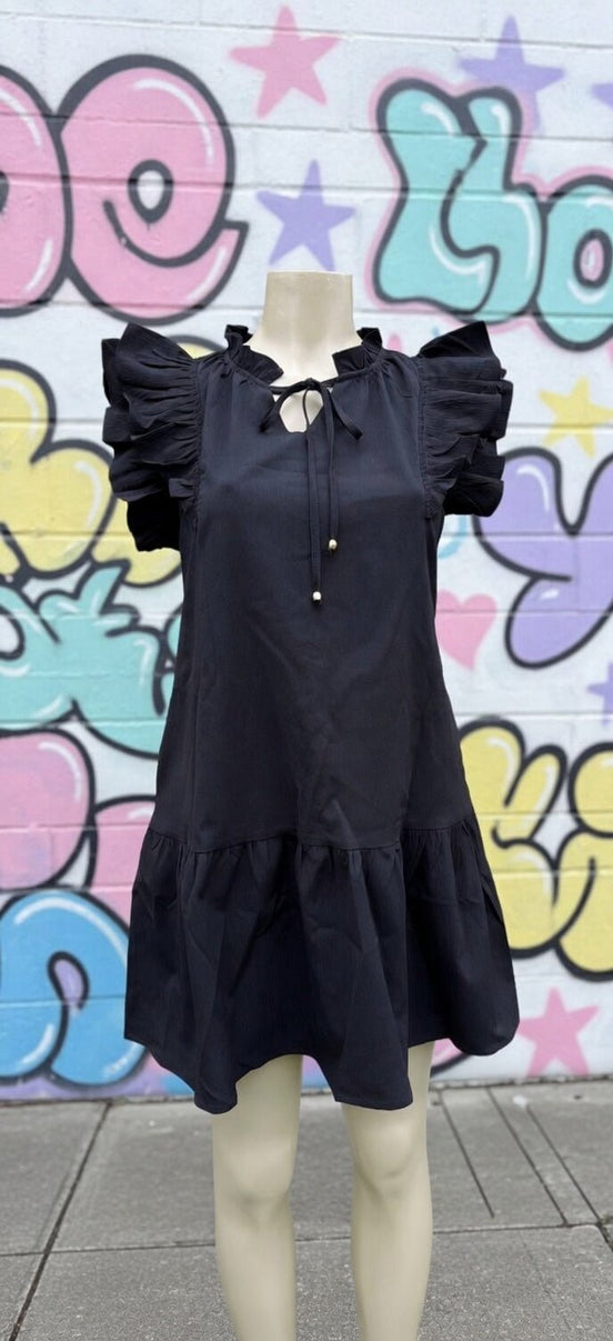 Black mini dress from Shiying Fashion featuring a fitted silhouette and stylish design, perfect for casual or evening wear.