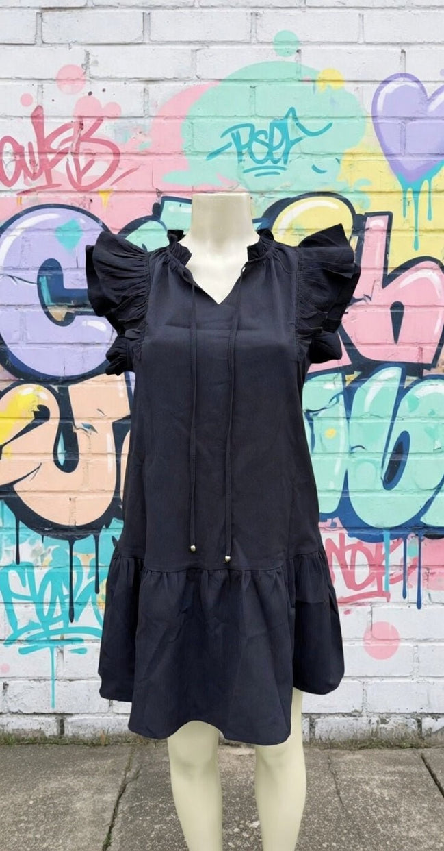 Black mini dress from Shiying Fashion, featuring a fitted silhouette and stylish design, perfect for casual or evening wear.