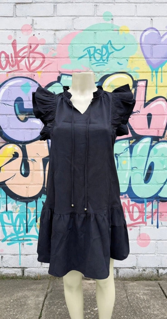Black mini dress from Shiying Fashion, featuring a fitted silhouette and stylish design, perfect for casual or evening wear.