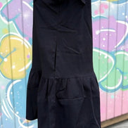 Black mini dress from Shiying Fashion featuring a fitted silhouette and sleeveless design, perfect for stylish occasions.
