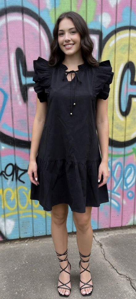 Black mini dress from Shiying Fashion featuring a fitted silhouette and short sleeves, perfect for casual or evening wear.