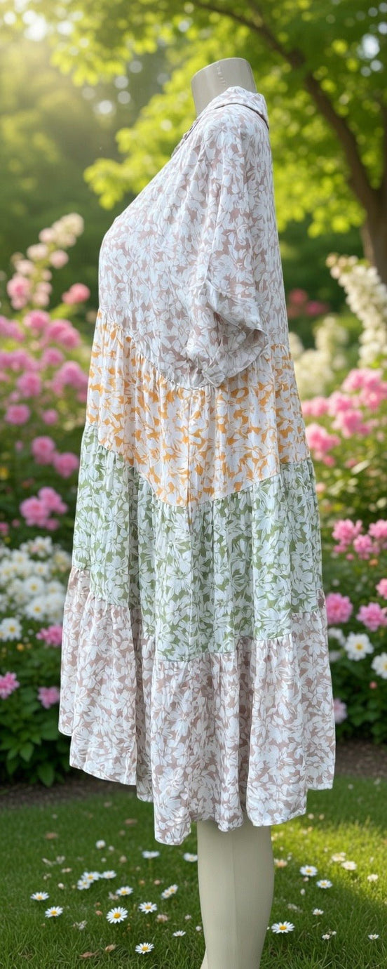Floral print loose dress by Shopin La featuring a flowy design and vibrant floral pattern, perfect for casual or summer wear.