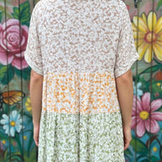 Shopin La floral print loose dress with a relaxed fit, featuring vibrant small floral patterns and flowing fabric.