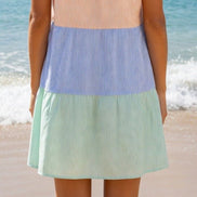 Multi-colored striped sundress by Shopin La featuring lightweight fabric, sleeveless design, and a flowing A-line silhouette.