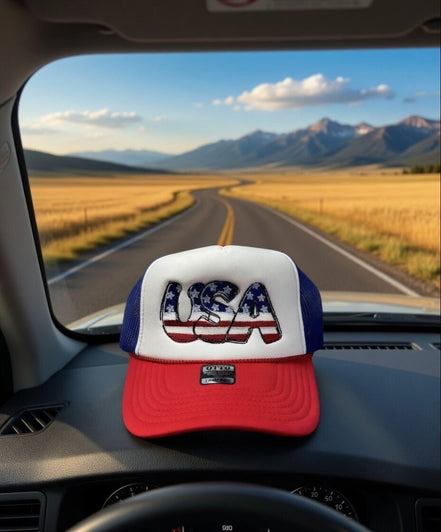 USA embroidered trucker hat by Southern Attitude Designs Inc, featuring a classic mesh back and bold embroidered USA flag design.