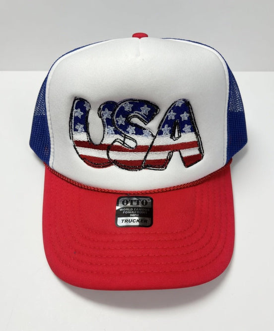 USA embroidered trucker hat by Southern Attitude Designs Inc, featuring patriotic red, white, and blue embroidery with mesh back.