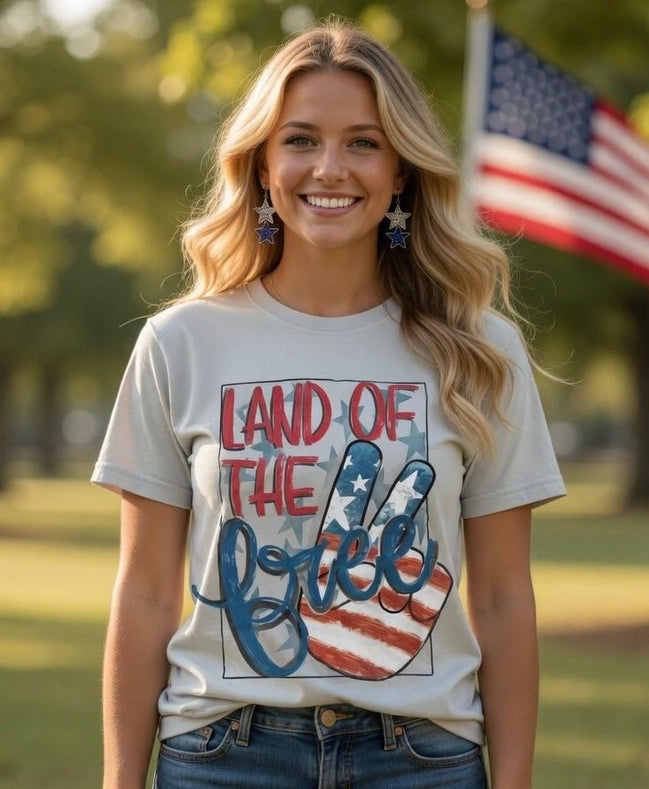 Red and white peace sign patriotic T-shirt by Southern Attitude Designs Inc, featuring a bold peace sign and American flag elements.