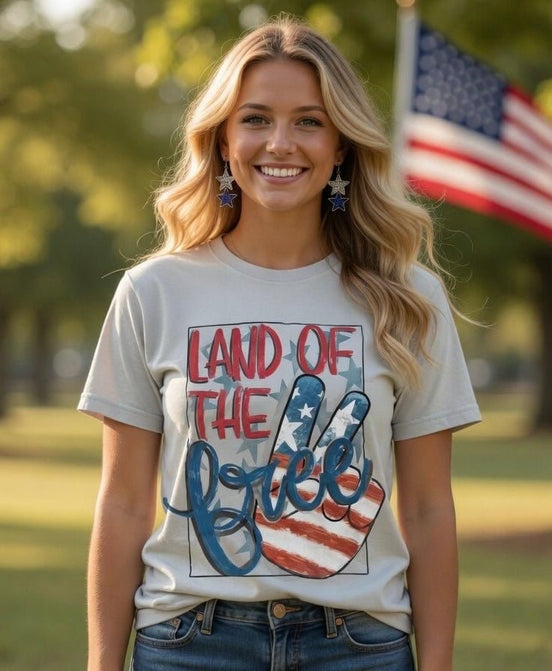 Red and white peace sign patriotic T-shirt by Southern Attitude Designs Inc, featuring a bold peace sign and American flag elements.