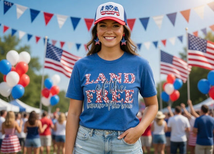 Leopard print patriotic T-shirt featuring American flag design and "Land of the Free" slogan, by Southern Attitude Designs Inc.