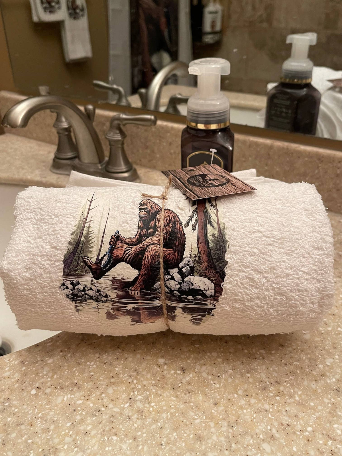 Set of three novelty Bigfoot-themed towels by Squatchin’ Country, featuring playful Bigfoot designs for bath use.