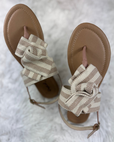 Beige and cream sandals from Stella Shoes featuring open toes and ankle straps, perfect for warm-weather casual wear.