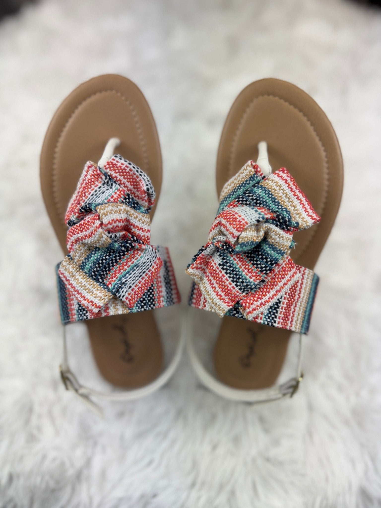 Multicolored Stella Shoes sling back sandals featuring a stylish design with multiple vibrant colors and open heel.