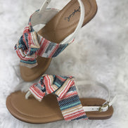 Multicolored Stella Shoes sling back sandals with open toes and ankle straps, featuring vibrant, multicolored woven design.
