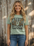Stay Groovy sunflower peace sign graphic T-shirt from The Lyrical Spirit, LLC featuring a colorful sunflower and peace symbol design.