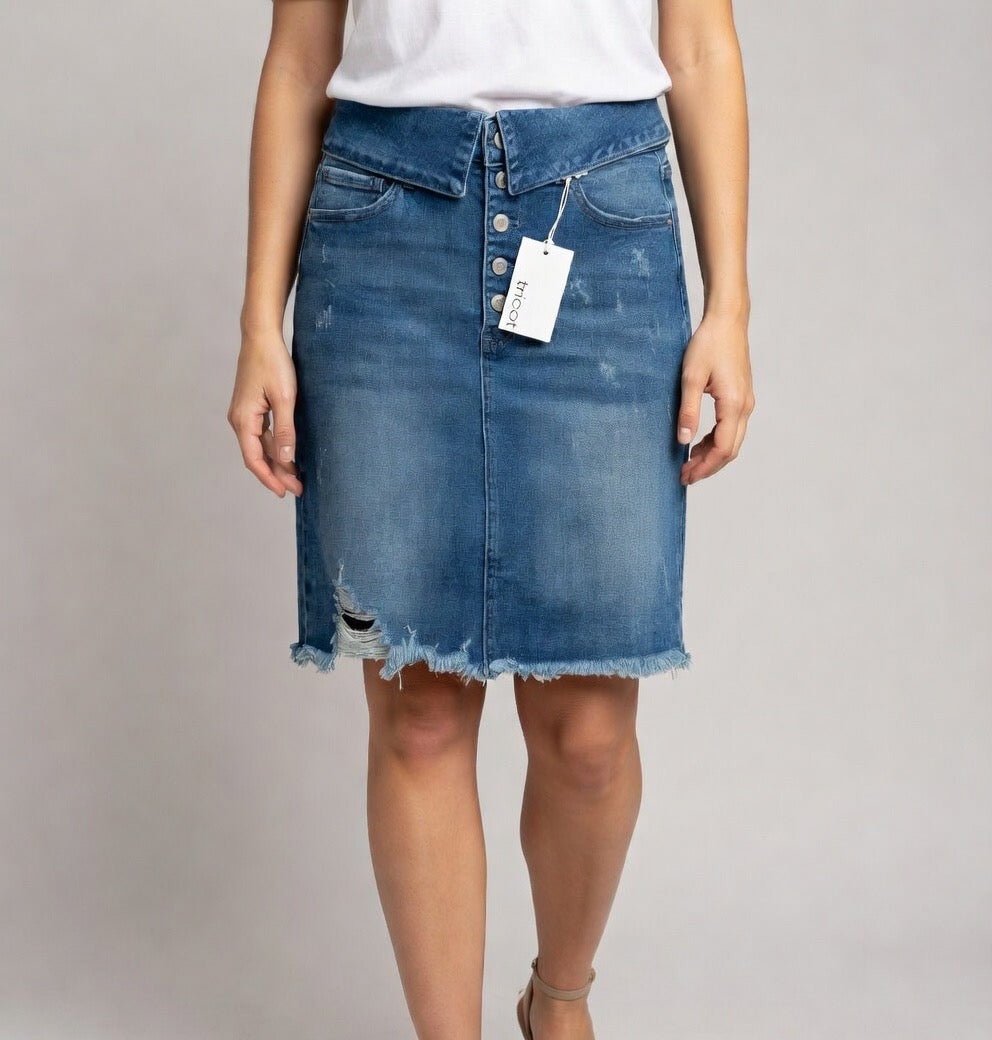 Urban Daisy denim mini skirt shown, featuring classic blue fabric with stylish frayed hem and high-waisted fit.