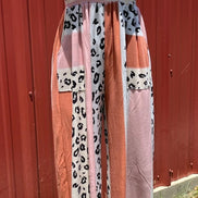 Vanilla Monkey animal print jumpsuit featuring a stylish romper design with bold animal patterns and a fitted silhouette.