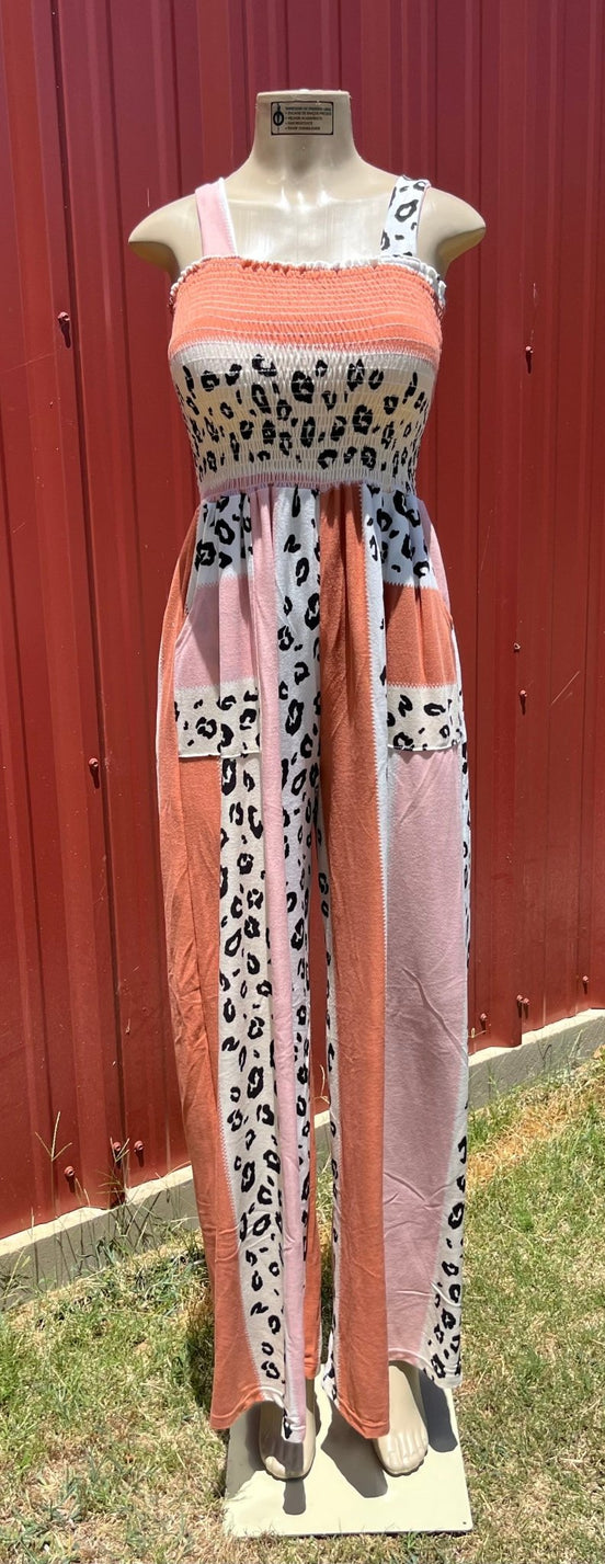 Vanilla Monkey animal print jumpsuit featuring a stylish romper design with bold animal patterns and a fitted silhouette.